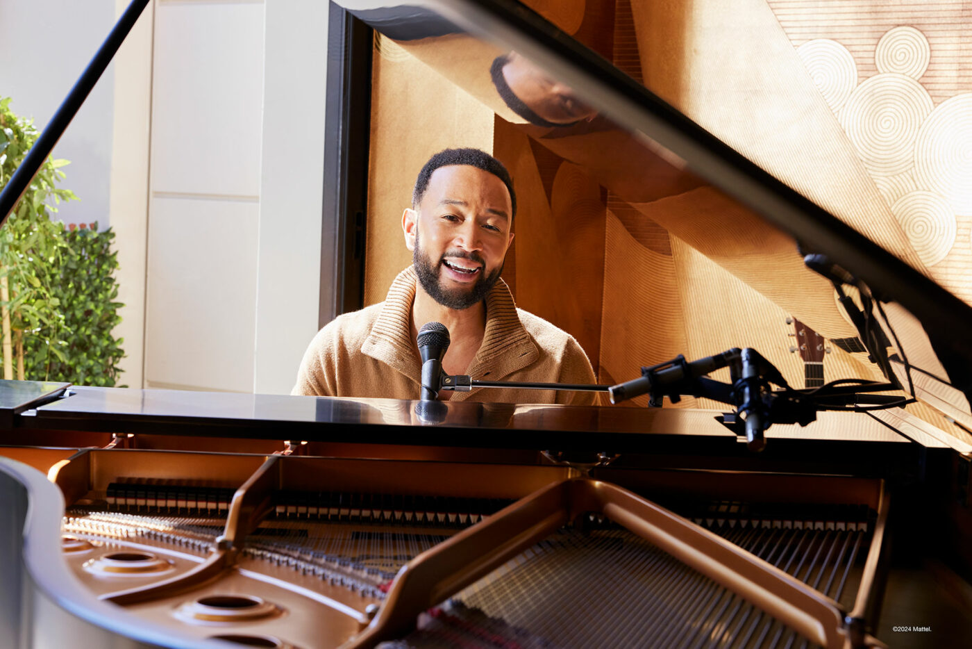 John Legend frente al piano